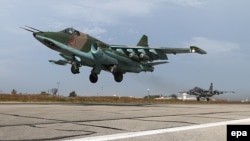 Российский бомбардировщик SU-25 на авиабазе Хмеймим в Латакии, Сирия, октябрь 2015 года 