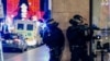 FRANCE -- French police officers stand guard near the scene of a shooting in Strasbourg, December 11, 2018